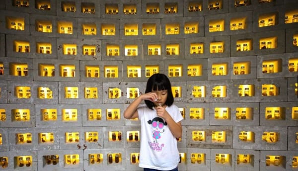 Girl at the botanical wall