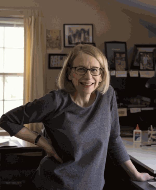 Roz Chast standing in her studio.