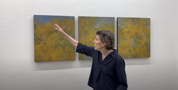 Tamar Zinn with her abstract paintings.