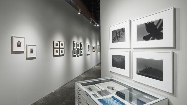 At right: Works by Masahisa Fukase