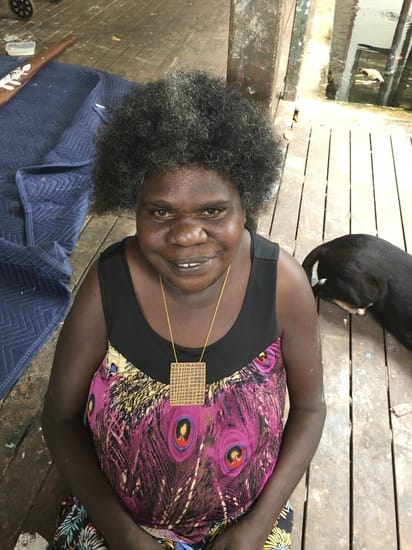 Marrnyula Munungurr wearing her first 'Djapu' clan bark necklace, Bulay(i) Project: Buku-Larrnggay Mulka