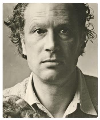 Italian sculptor Marino Marini working on a portrait of Henry Moore in his art studio