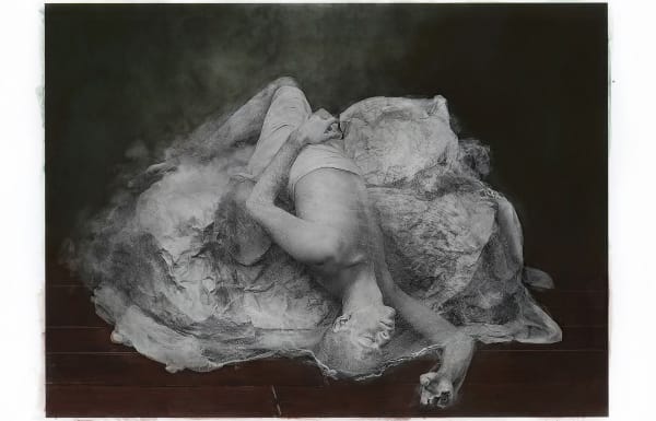 Katie Eleanor, Hand coloured print, portrait of a young man laying semi nude on a bad, sleeping, falling with head and hand down to the floor, sculpture like, human sculpture