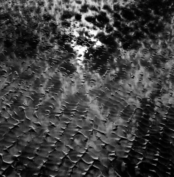 Michael G Jackson, Poppit Sands #13, silver gelatin print, hand printed in the darkroom, sand patterns, Wales, beach, sky, clouds reflection in water and sand, beautiful print, black and white photography, MX Gallery, artwork for the wall