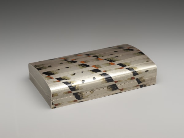 Oshiyama Motoko (Japanese, born 1958). Evening Haze (Banka) Document Box, 2009. Heisei period (1989–2019). Silver, copper and gold alloy (shakudō), brass, and copper. H. 2 in. (5.1 cm); W. 9 in. (22.9 cm) D. 5 1/2 in. (14 cm). The Metropolitan Museum of Art, Gift of Hayashi Kaoru, in celebration of the Museum’s 150th Anniversary, 2020 (2020.76.10a, b). Image © Oshiyama Motoko