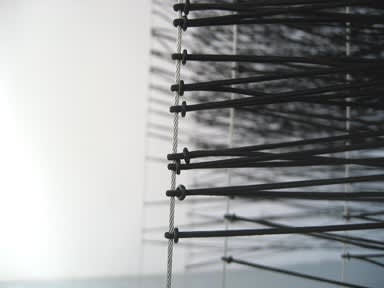 Karilee Fuglem, "There's a place on my back that isn't there" (detail), polyester-wrapped elastic thread, rubber o-rings, steel cables, wood and steel platform