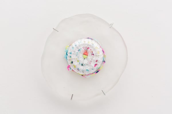 Ana Cvorovic Insoluable Blossoms 2019 polyurethane resin, glassware, child swimsuit, crochet dollies dimensions variable