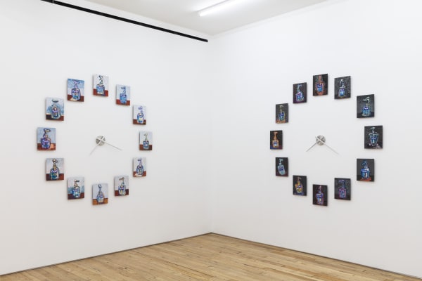 Installation view of Susan Chen: Purell Night & Day at Rachel Uffner Gallery. Left: “Purell Clock: Day” (2023), soft pastel...