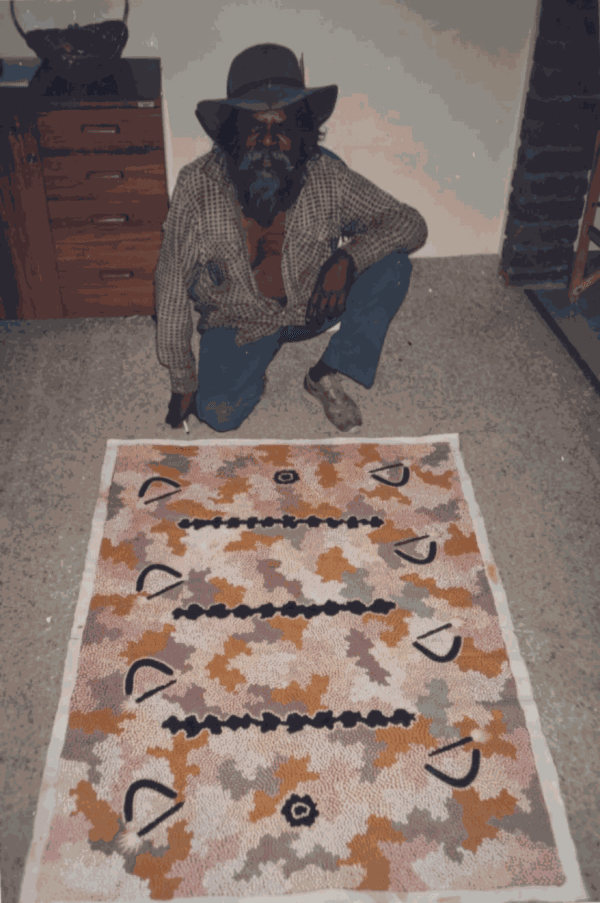 Clifford Possum and his painting for the gallery, 30 December 1988