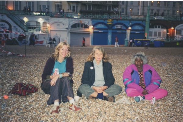 Rebecca Hossack, Pat Lowe and Mona Chuguna on Brighton Beach