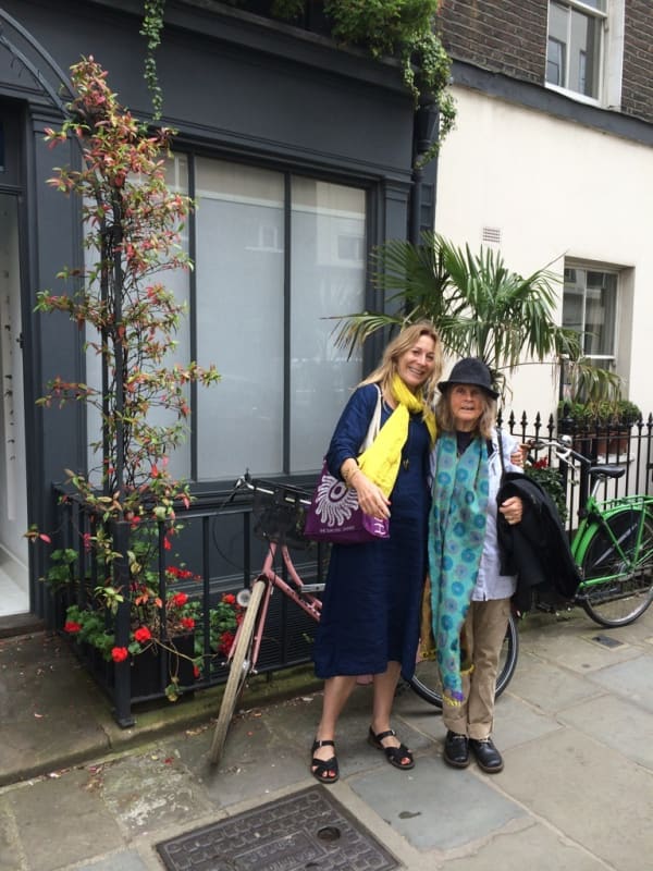 Rebecca Hossack with Pat Lowe outside Rebecca Hossack's house
