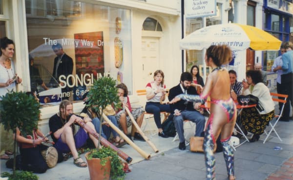 Performance outside Rebecca Hossack Art Gallery during Songlines exhibition
