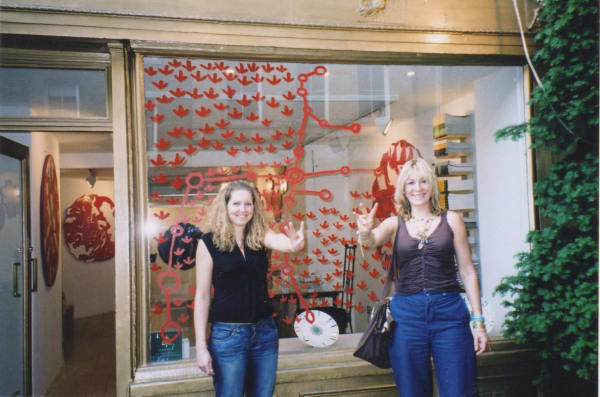 Rebecca Hossack outside Songlines exhibition at Rebecca Hossack Art Gallery