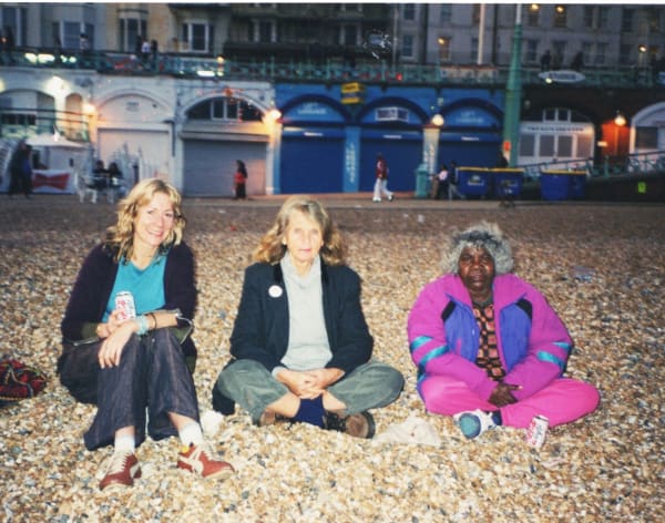 Rebecca Hossack, Pat Lowe and Jukuna Mona Chuguna on Brighton Beach