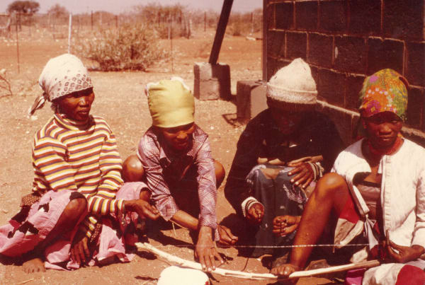 Rebecca's trip to the Kalahari: a group of women playing the dakateri