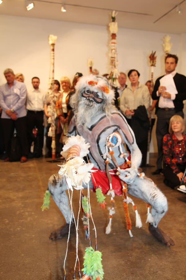 Gali Yalkarriwuy Gurruwiwi dancing with his Morning Star pole at the gallery