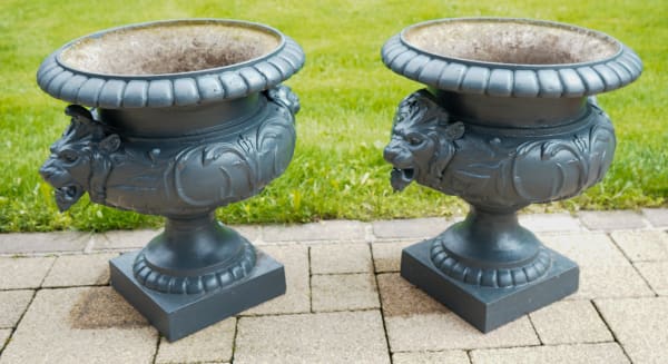 attributed to Corneau Frères at Charleville, A PAIR OF SECOND EMPIRE FRENCH CAST IRON GARDEN URNS