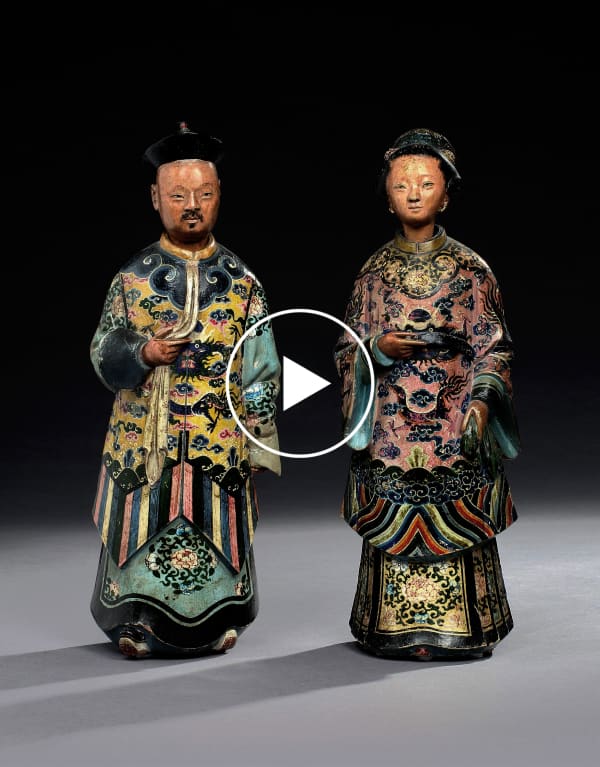 A PAIR OF STANDING NODDING FIGURES IN POLYCHROME DECORATED CLAY