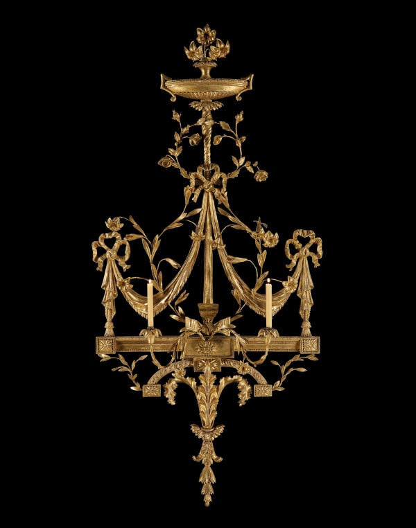 A GEORGE III GILTWOOD TWO-BRANCH WALL-LIGHT.