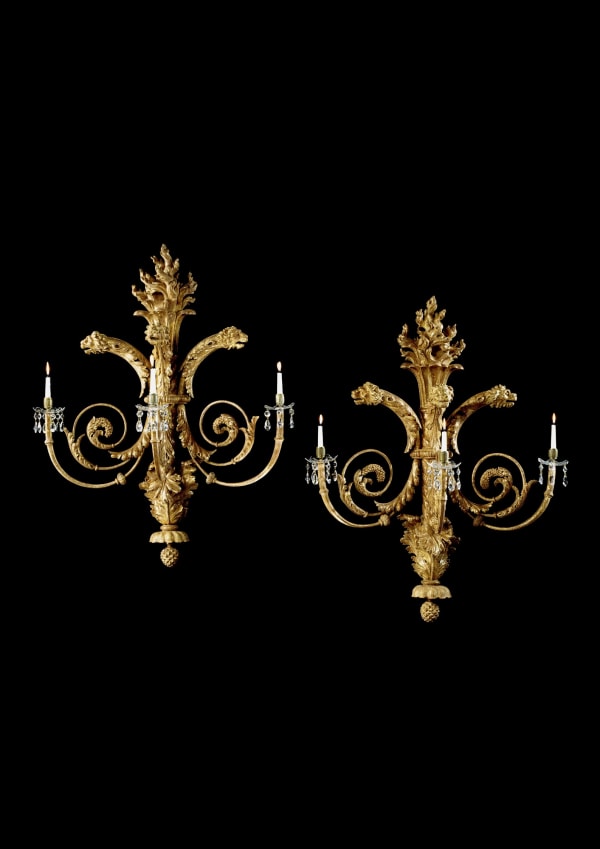 AN ENORMOUS PAIR OF REGENCY CARVED GILTWOOD WALL LIGHTS