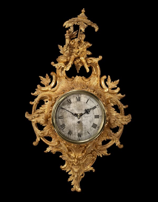 A GEORGE II CARTEL CLOCK ATTRIBUTED TO THOMAS JOHNSON