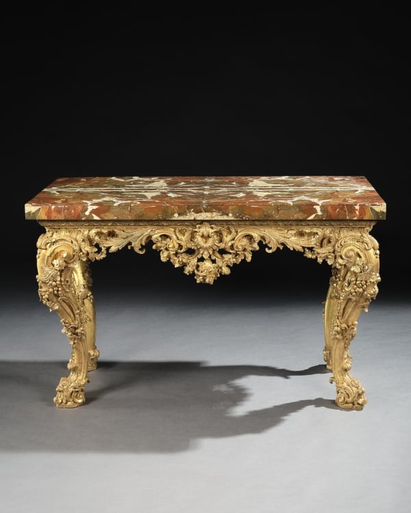 A GEORGE II GILTWOOD SIDE TABLE , The table base: English, circa 1755 The jasper top: English, circa 1730