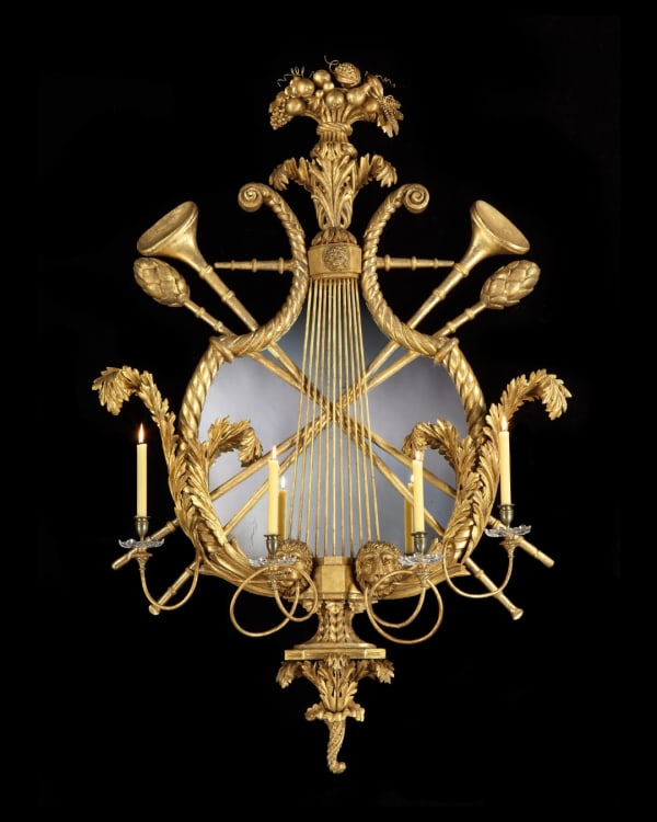 A MASSIVE CONTINENTAL REGENCY PERIOD GILTWOOD FOUR LIGHT GIRANDOLE