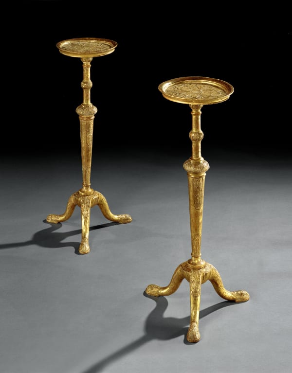 A PAIR OF GEORGE II GILT GESSO TRIPOD STANDS, English, circa 1720