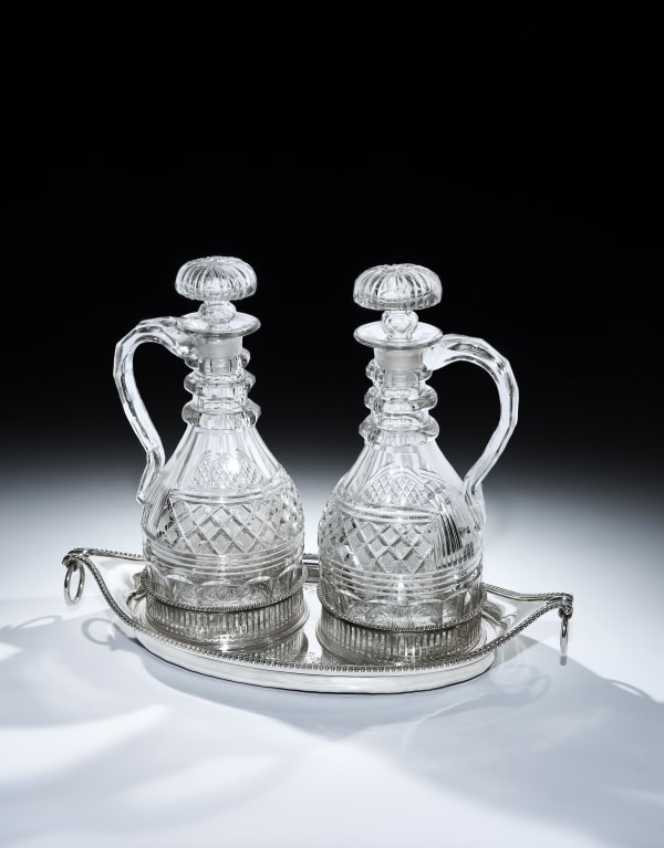A PAIR OF REGENCY CLARET JUGS