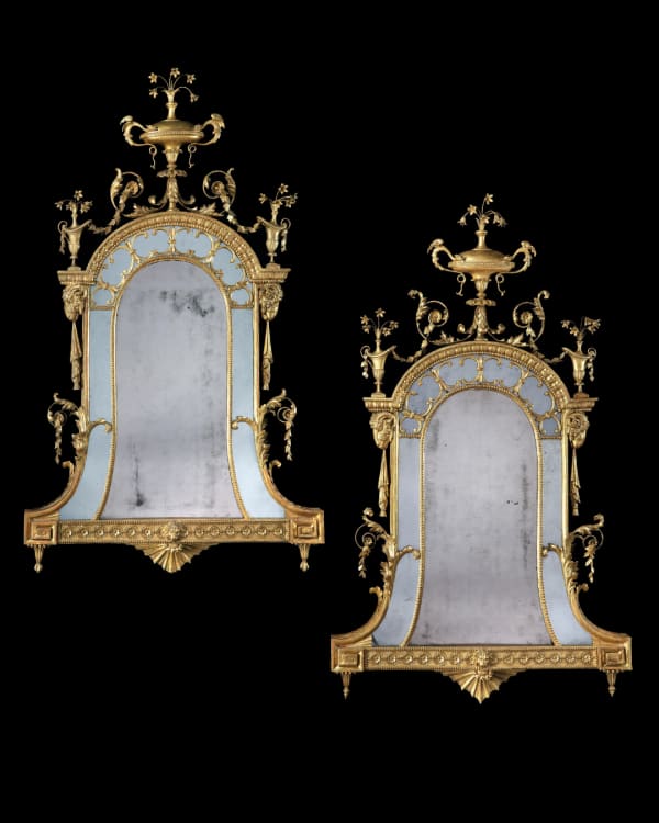 A PAIR OF GEORGE III GILTWOOD AND COMPOSITION MIRRORS