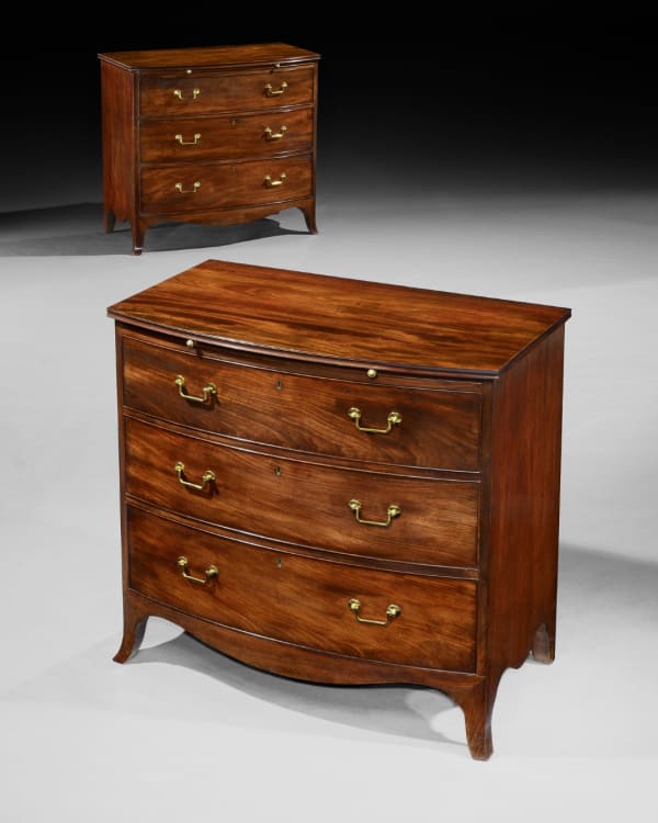 A PAIR OF GEORGE III MAHOGANY CHESTS OF DRAWERS, English, circa 1795