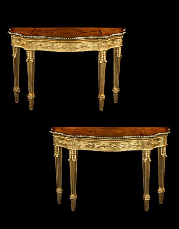 A pair of George III ormolu mounted satinwood marquetry and giltwood side tables attributed to mayhew and Ince.