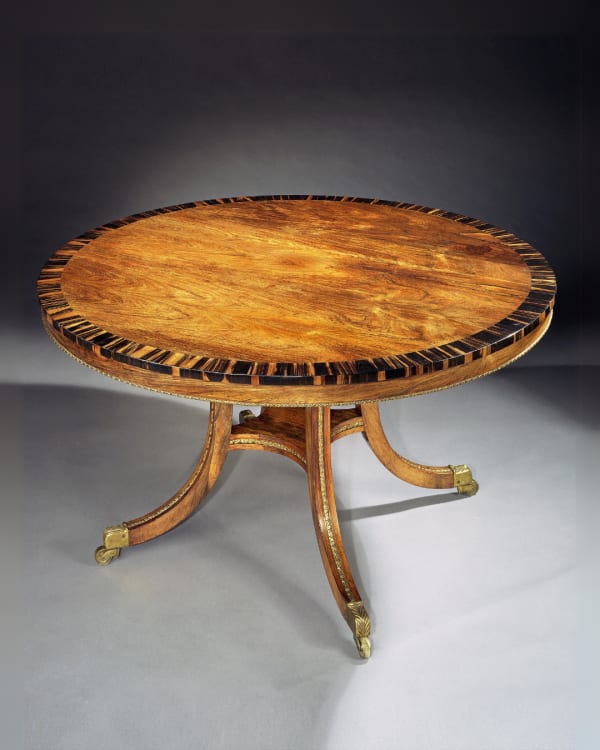 A REGENCY ROSEWOOD CENTRE TABLE ATTRIBUTED TO GILLOWS
