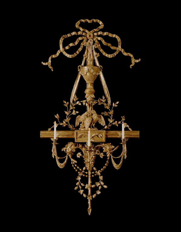 A GEORGE III CARVED GILTWOOD WALL LIGHT