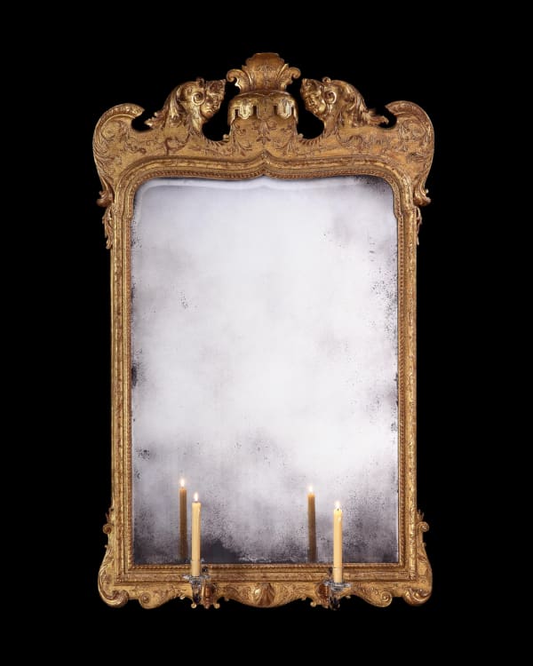 A GEORGE I GESSO AND GILTWOOD MIRROR ATTRIBUTED TO MOORE & GUMLEY