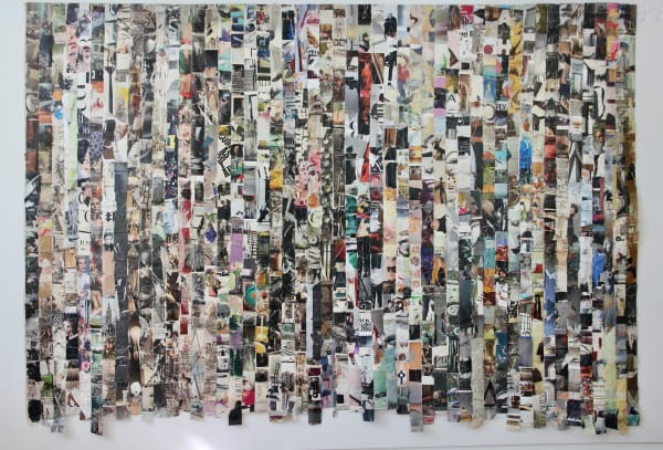 This magnificent quilt fills a whole wall of the gallery and is composed of long strips of magazine images, the width of packing tape. Some of these strips are solid colors, some include imagery and/or text elements. The magazine-page strips are affixed t