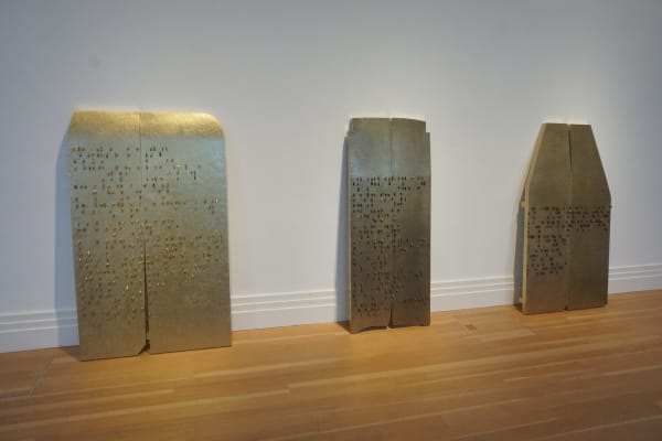 Push towards silence and blindness, 2023 3 tribulums in yellow copper