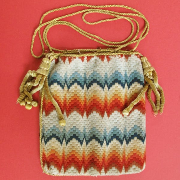 Stylish mid 19th century woollen needlework reticule with chenille tassels.
