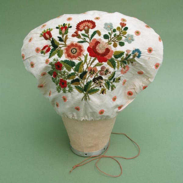 Regency French bonnet decorated with lovely colourful chenille flowers. Excellent condition. No alterations or damage.