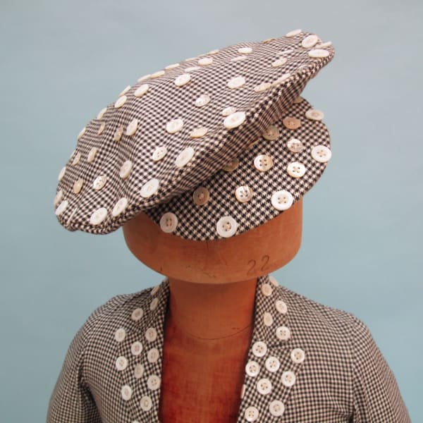 Rare early 20th century child's pearly outfit. In great condition.