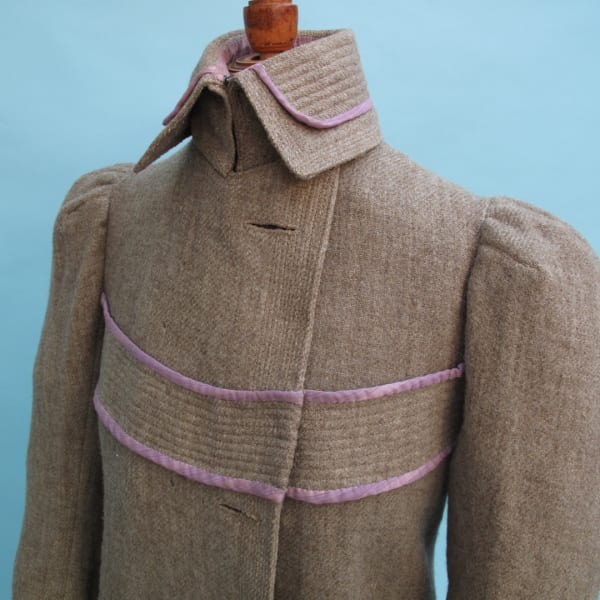 Beautifully tailored Edwardian winter lady's coat. There is some slight age-related damage and the original buttons are missing.