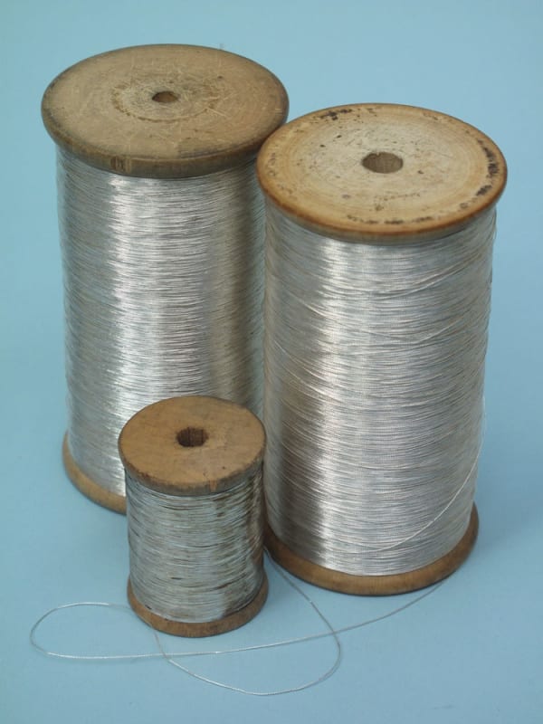 A selection of bullion thread and trimmings in both gold and silver.