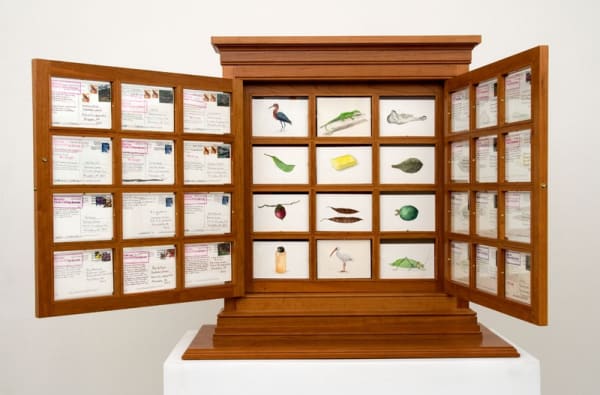 cabinet with postcards