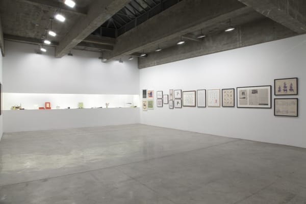 installation view of framed drawings