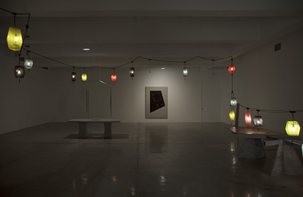 Boyce installation image at TBG NY, dark room with lanterns