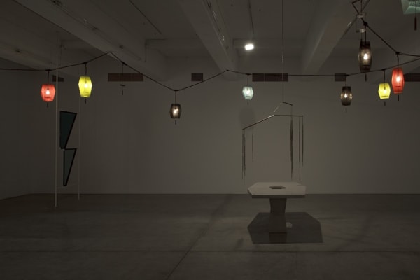 Boyce installation image at TBG NY, dark room with lanterns