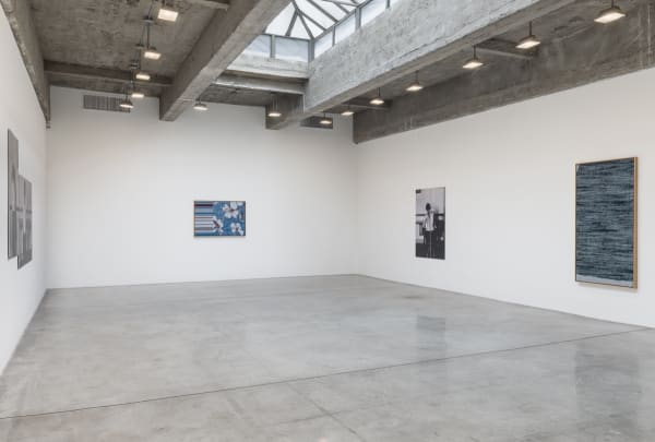 Lisa Oppenheim installation view, women working photographs