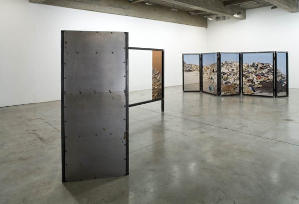 image of Hornig sculptures with transparent photographs
