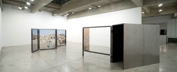 image of Hornig sculptures with transparent photographs