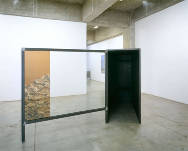 image of Hornig sculptures with transparent photographs
